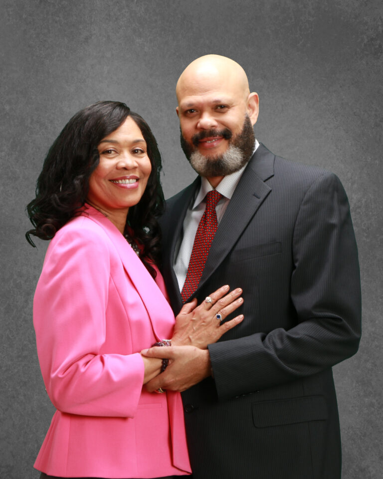 JMP suits hip face each other grey backdrop